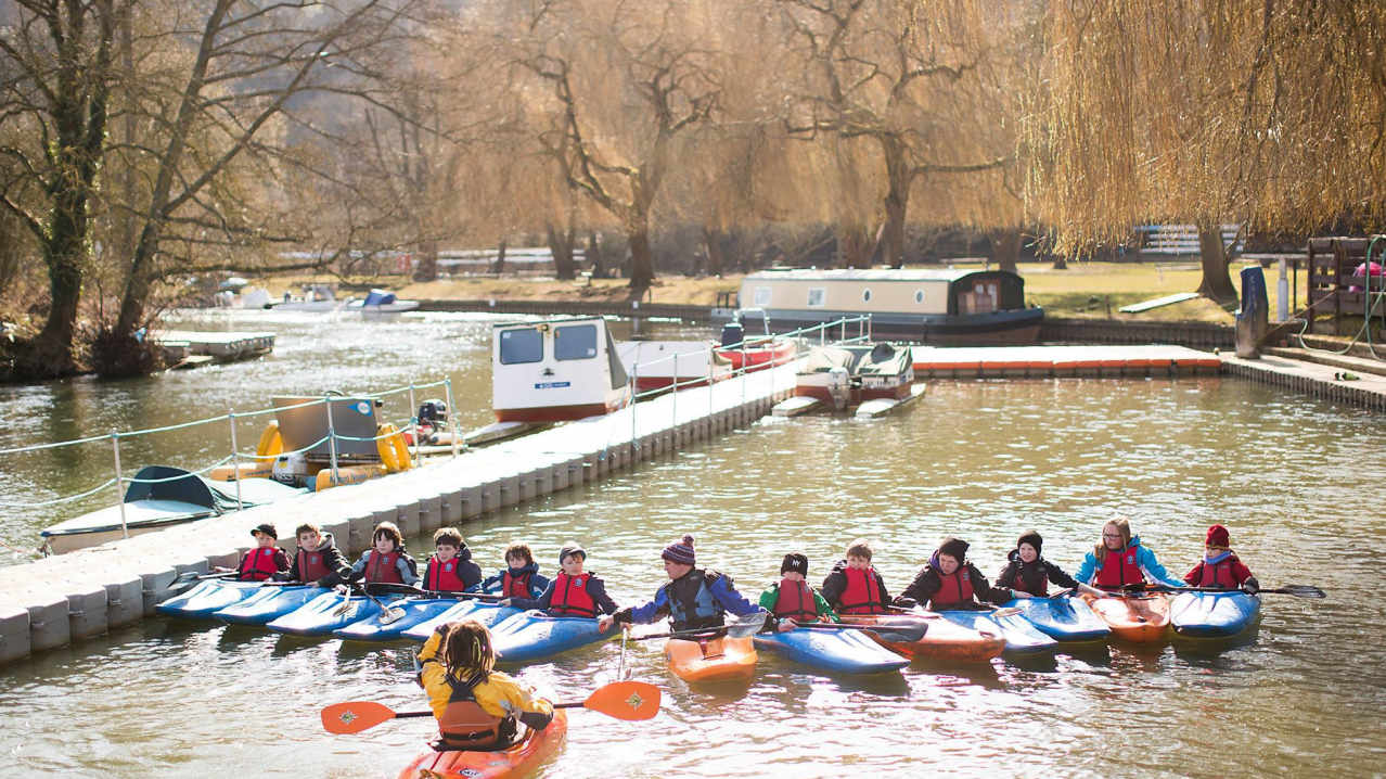 Kids and instructors in kayaks at Longridge Activity Centre in Marlow Kids and instructors in kayaks at Longridge Activity Centre in Marlow