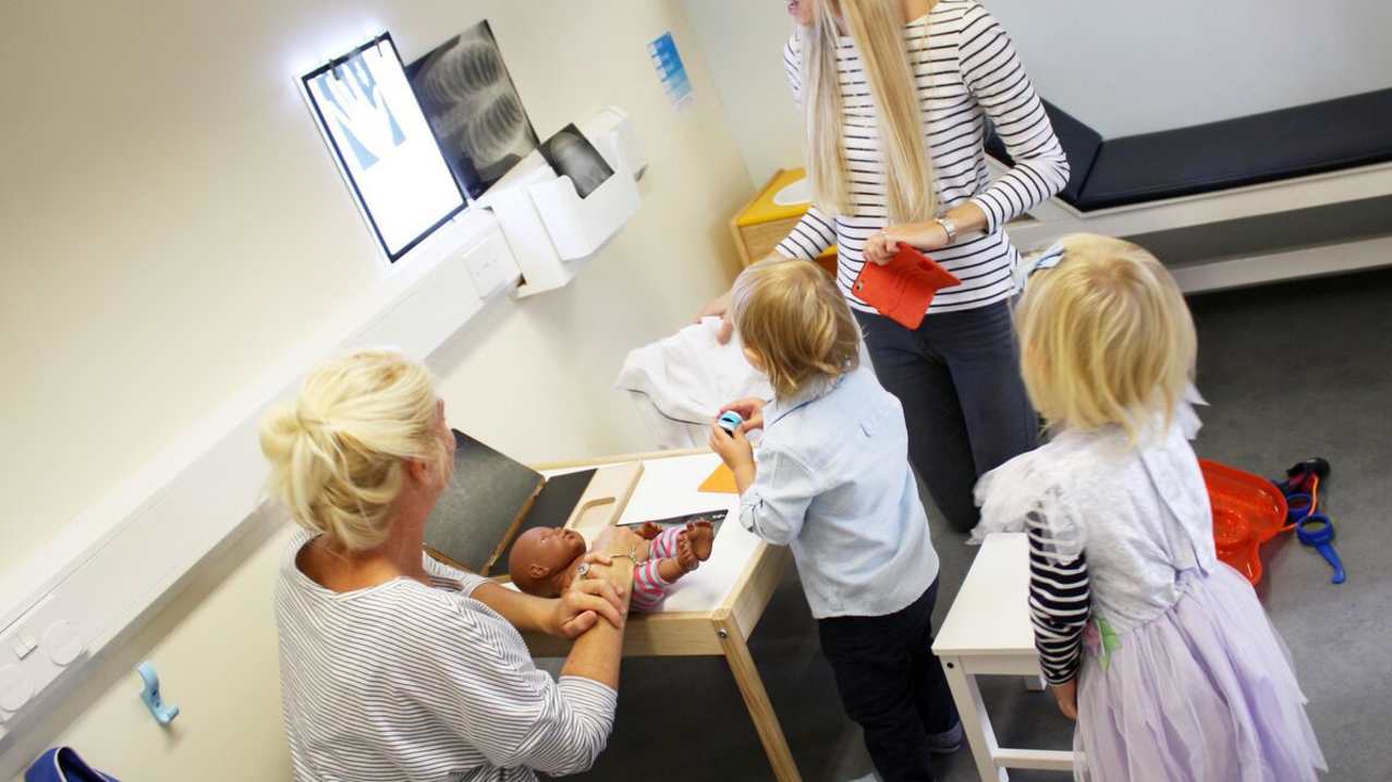 Kids at a role play doctor's office at Tots Town in Norwich Kids at a role play doctor's office at Tots Town in Norwich