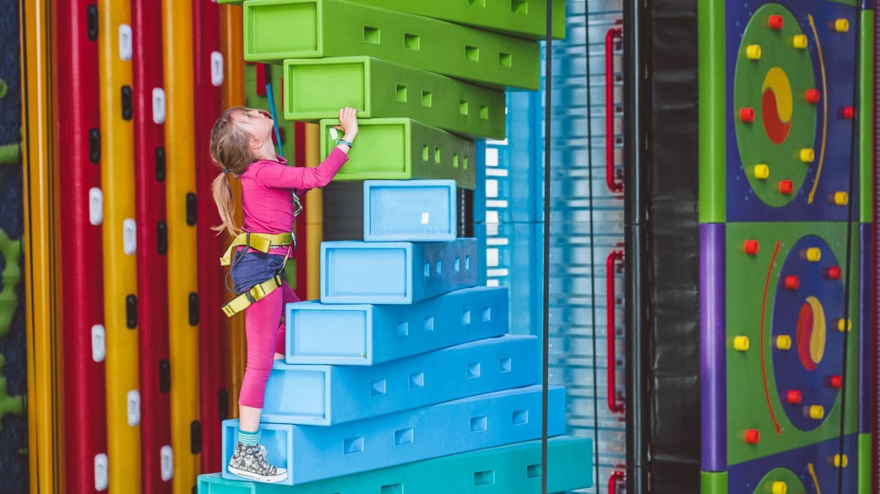Girl climbing at Clip n Climb Preston Girl climbing at Clip n Climb Preston