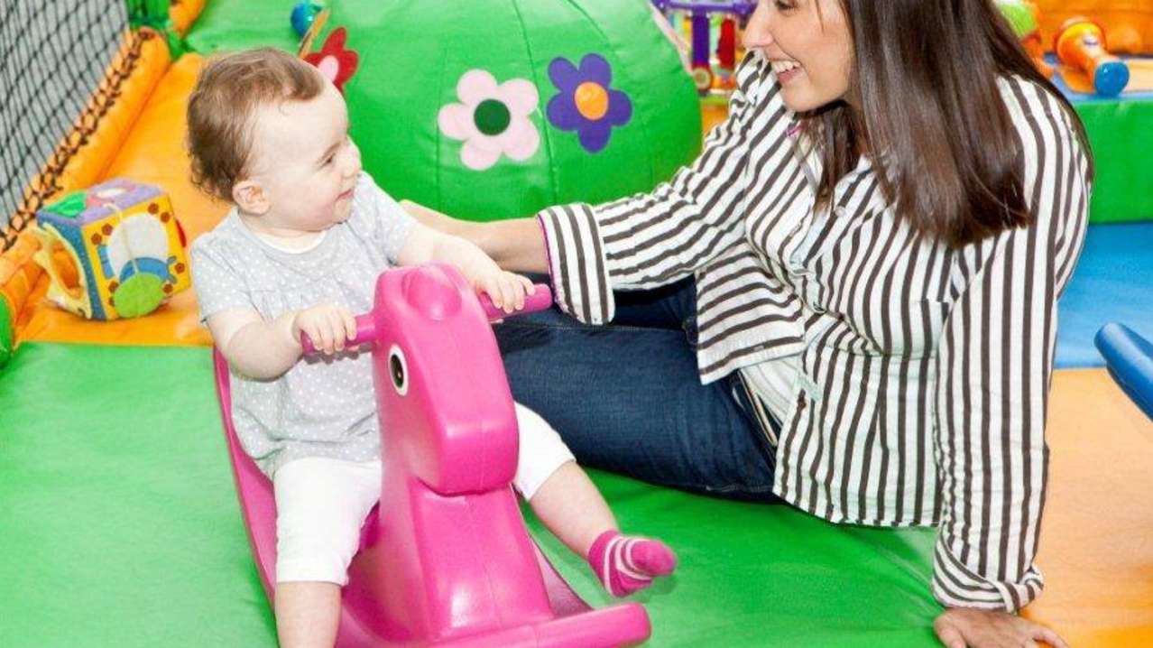 Mom and daughter in toddler soft play area at Fun4All Chester