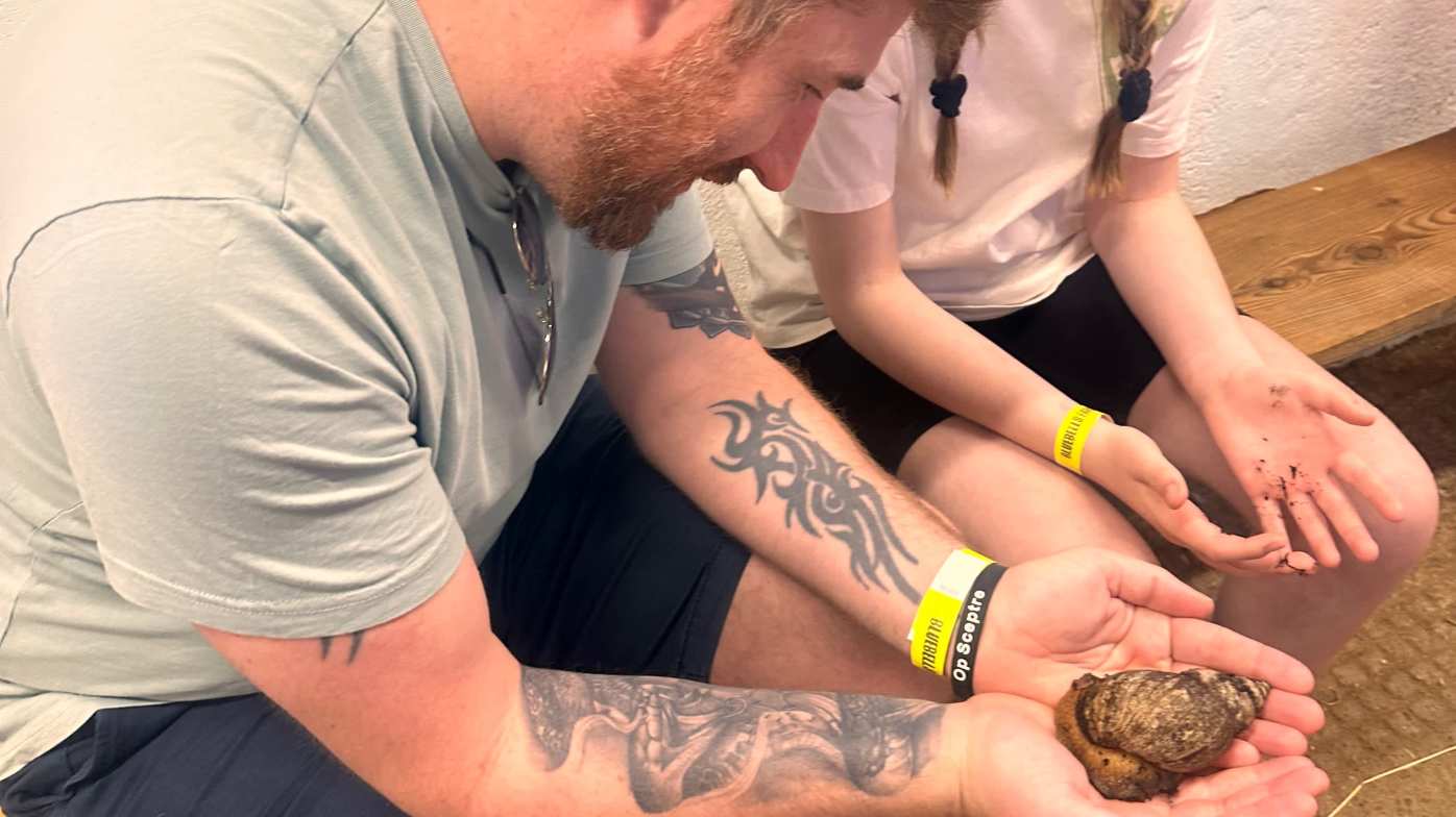 Holding a snail