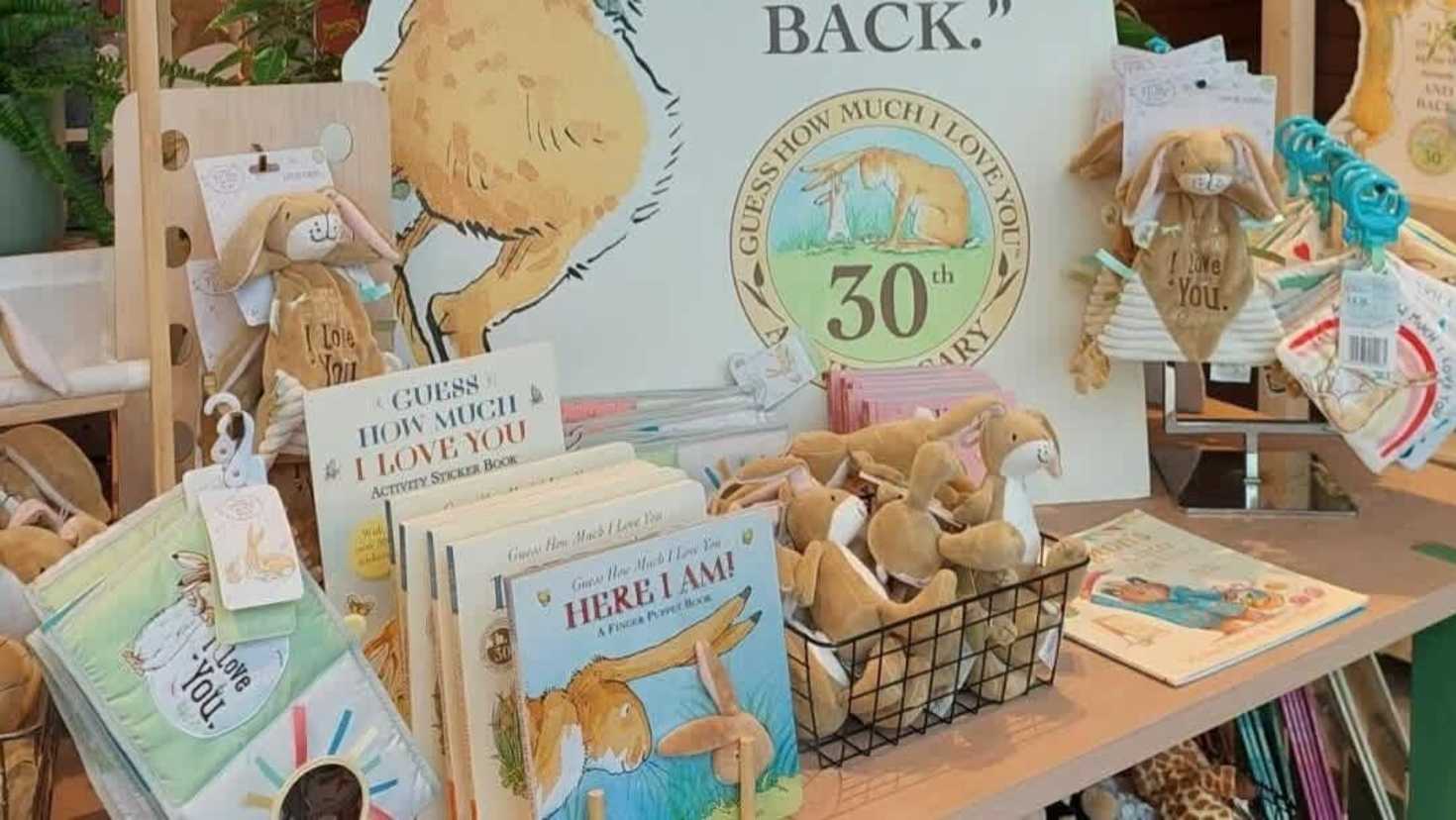 “Guess How Much I Love You” 30th anniversary children’s book display at the RHS Garden Bridgewater gift shop, perfect for family visitors and young readers.