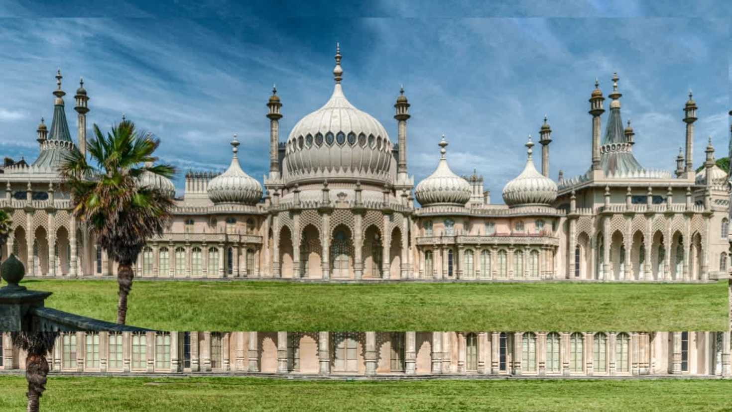outside of royal pavilion with blue skies and water in the foreground