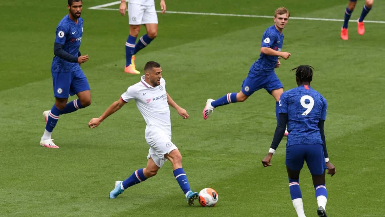 Chelsea FC players in action during a Premier League match at Stamford Bridge