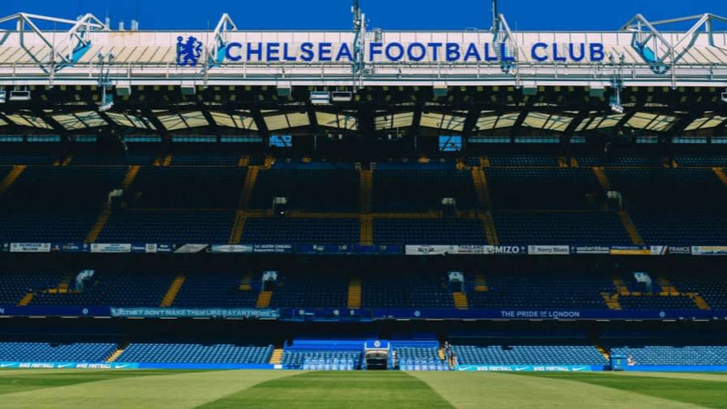 Chelsea Football Club stand and seating area inside Stamford Bridge on a stadium tour