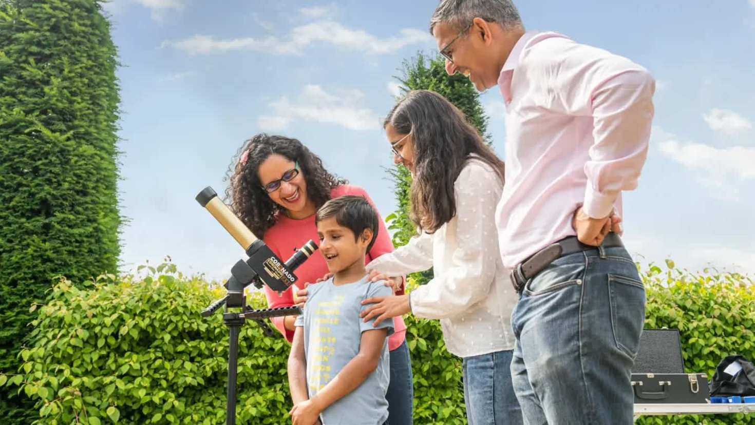 Family using outdoor telescope at Royal Observatory Greenwich
