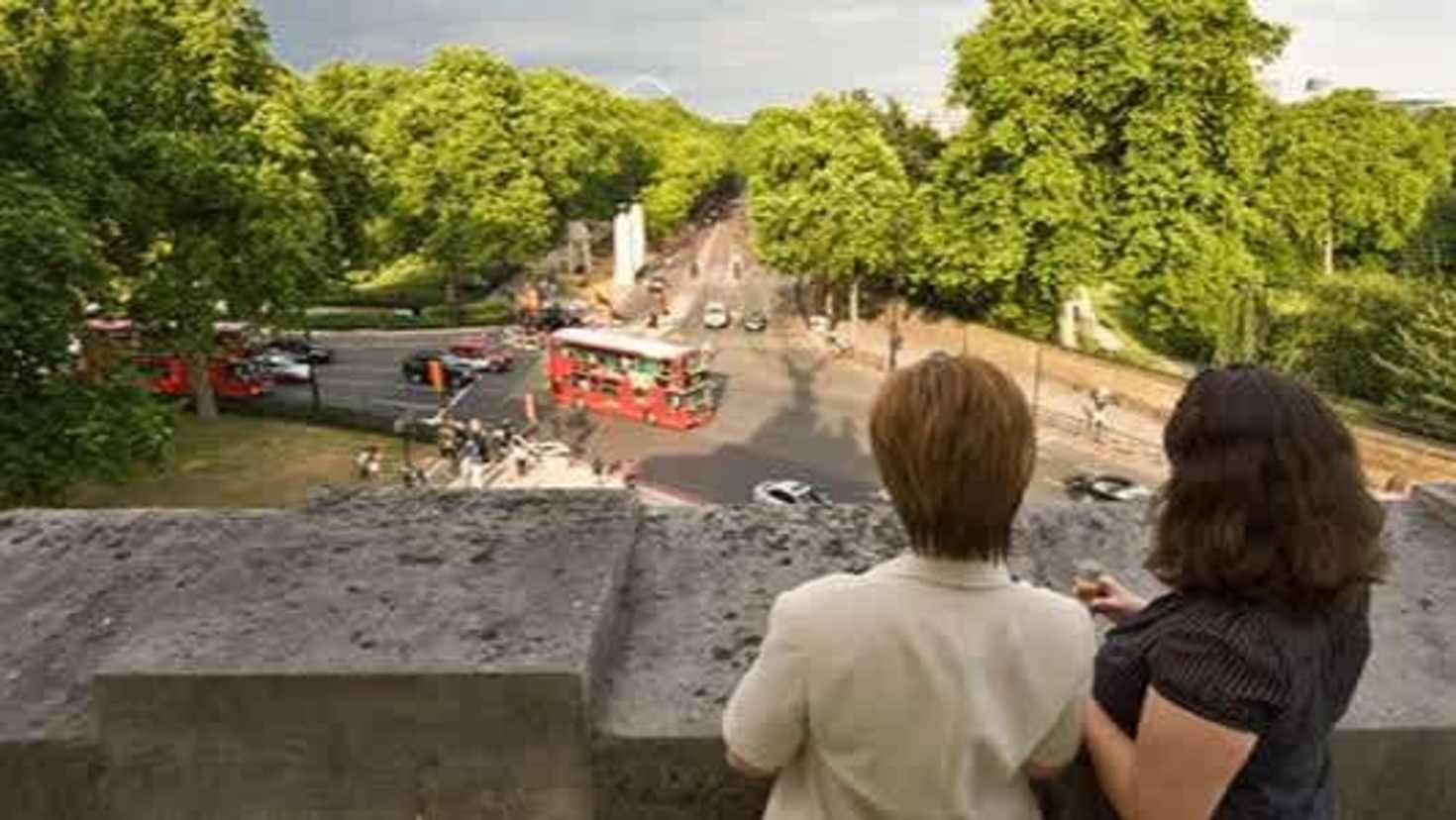 Visitors enjoying panoramic views from the balcony of Wellington Arch in London