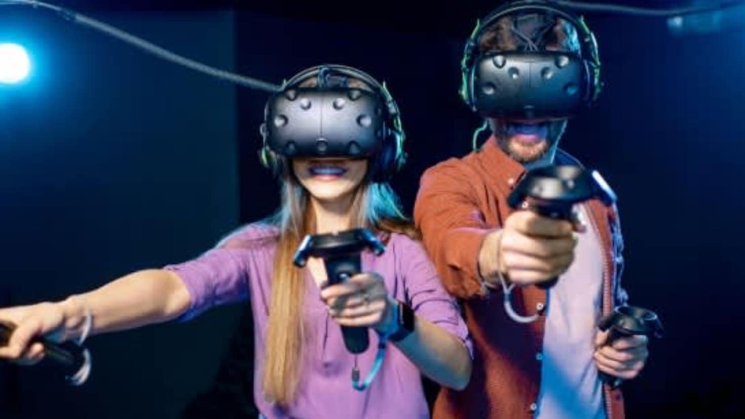 Two players enjoying an immersive multiplayer VR game at DNA VR Camden