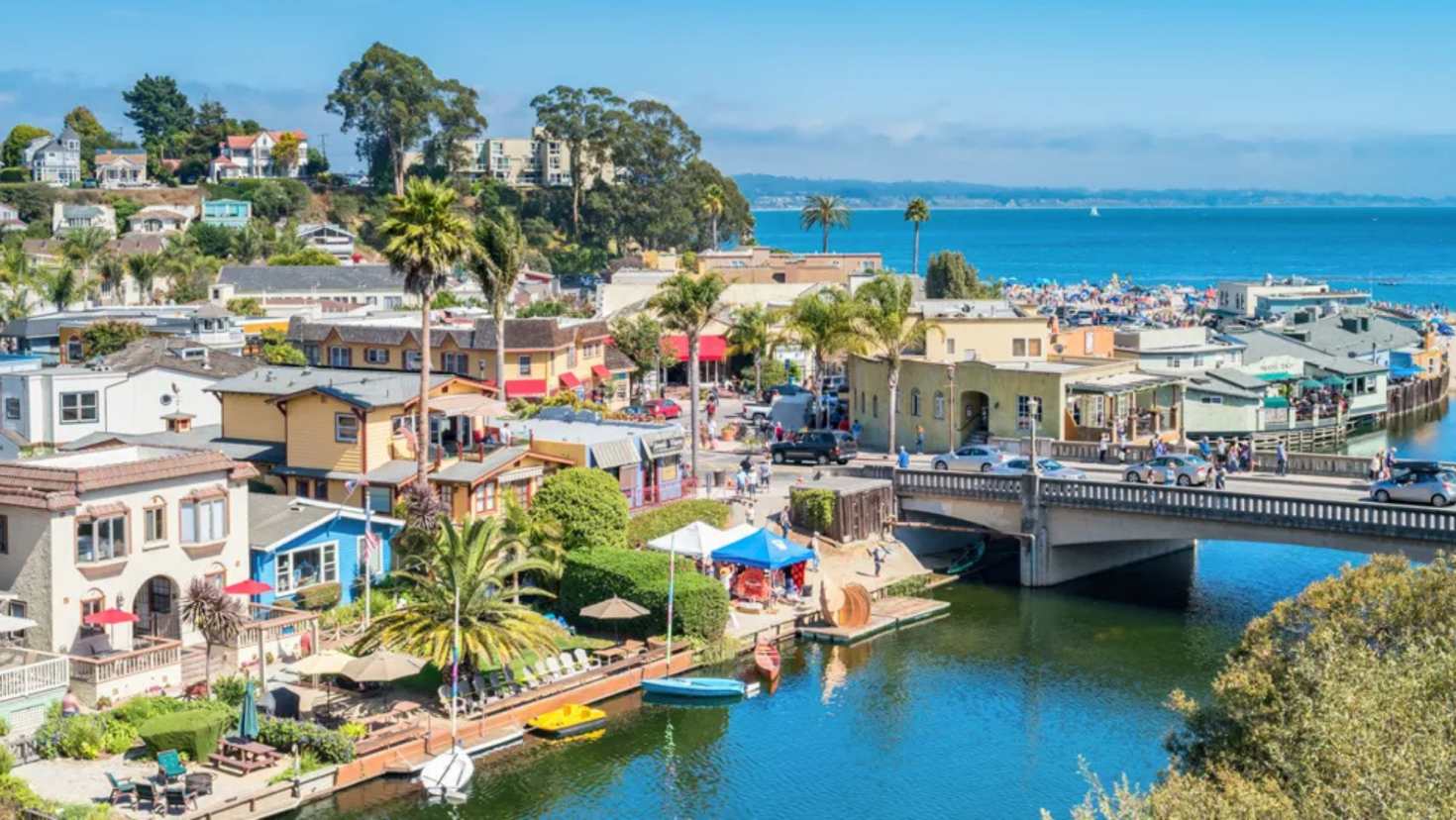 Capitola Wharf extending over the Pacific Ocean with coastal views Capitola Wharf extending over the Pacific Ocean with coastal views