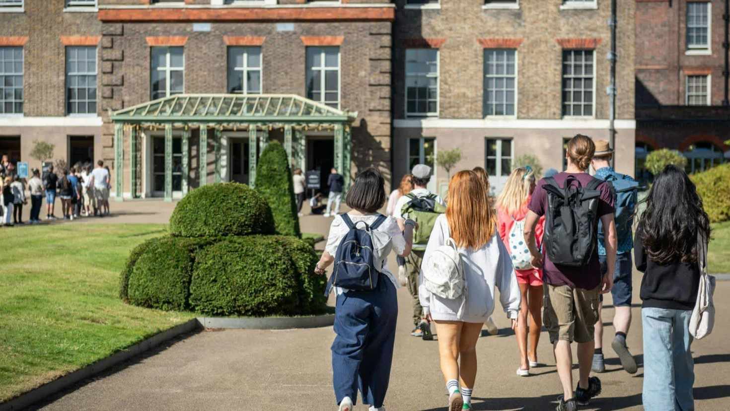 Exterior facade of Kensington Palace with red brick and white windows Exterior facade of Kensington Palace with red brick and white windows
