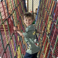 Child playing in a soft play Child playing in a soft play