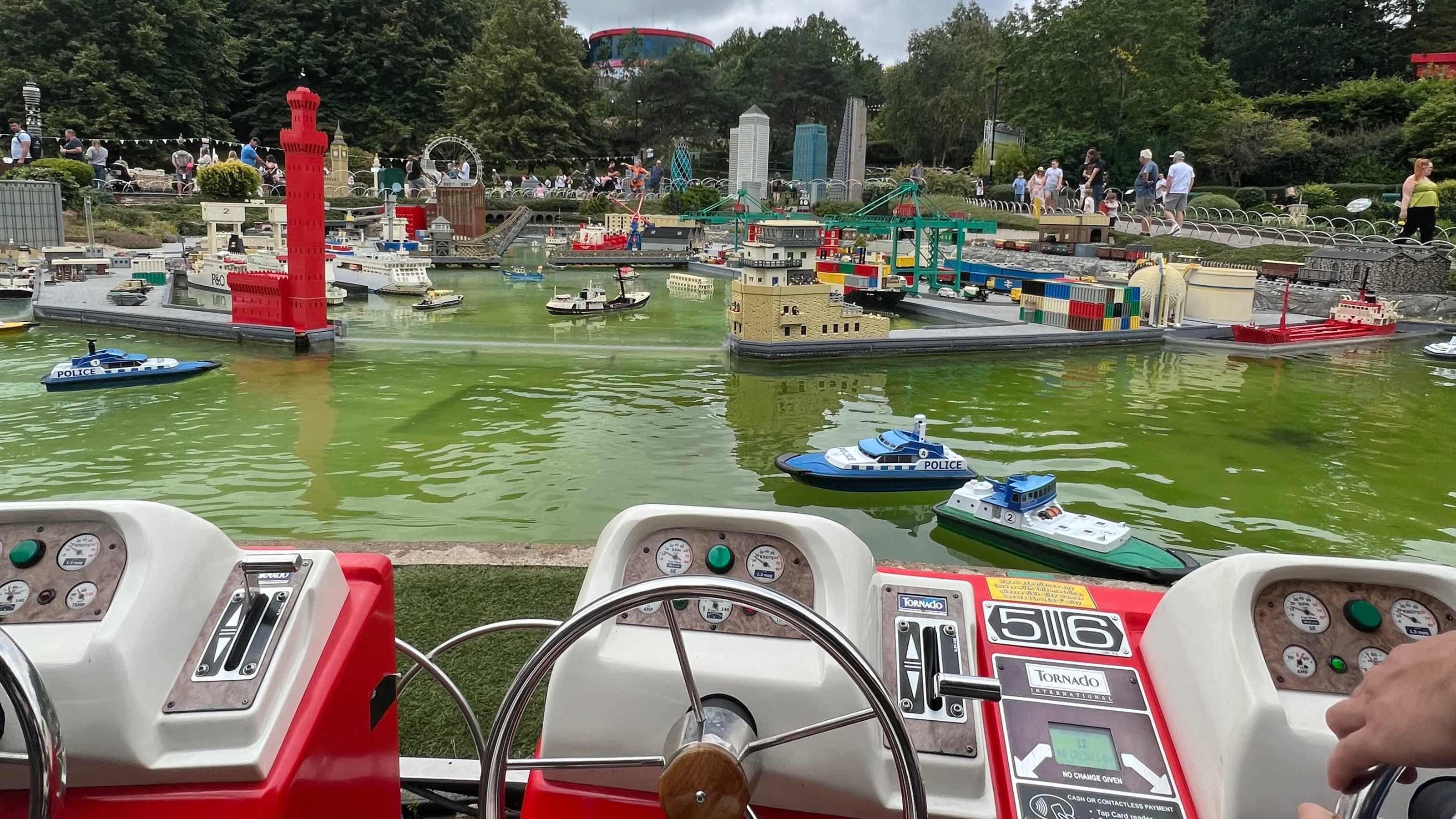 Driving the boats around miniland Driving the boats around miniland