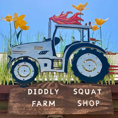 Our first glimpse of the famous Diddly Squat Farm Shop – the start of a visit we’d been looking forward to for a long time. Our first glimpse of the famous Diddly Squat Farm Shop – the start of a visit we’d been looking forward to for a long time.