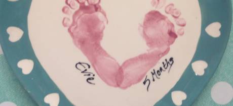 Foot prints on plate at Wot Pots in Bristol