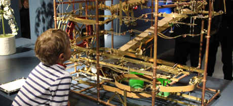 Boy looking at display at The MAD Museum in Stratford upon Avon