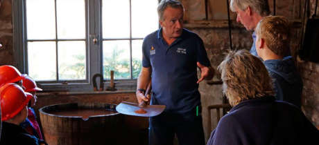 Staff talking to visitors at Geevor Tin Mine in Penzance