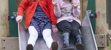 Girls on slide at Worsbrough Mill Museum and Country Park in Barnsley