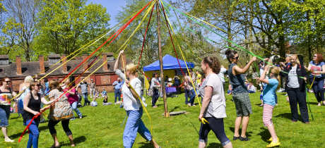 People do maypole dance at Avoncroft Museum of Historic Buildings in Bromsgrove