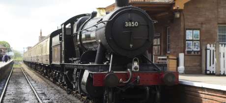 Steam train at platform at West Somerset Railway in Minehead