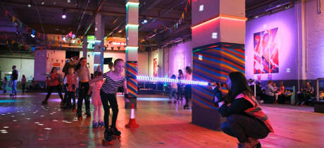 Families rollerskating at RollerStop Roller Rink in Glasgow