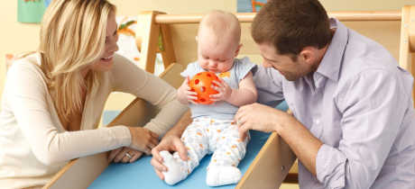 Parents playing with baby at Gymboree Play Sevenoaks