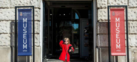 Girl at entrance of The Household Cavalry Museum in London
