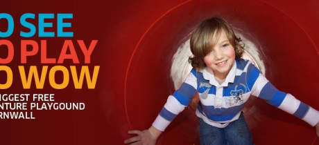 Kid in playground tunnel at Heartlands in Pool