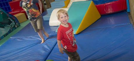 Kids playing in soft play area at Newbridge Farm Park in Ledbury