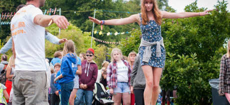 Girl on balancing rope at Howard Park and Gardens in Letchworth
