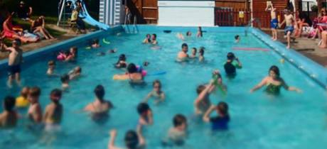 Families in outdoor swimming pool at Findon Swimming Pool in Worthing
