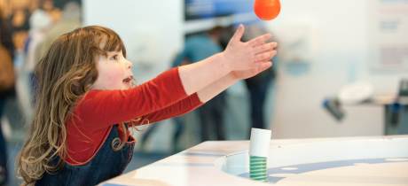 Girl playing at Royal Air Force Museum Cosford in Shifnal