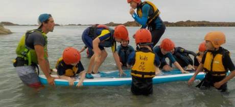 Kids on Paddle board at Outdoor Guernsey