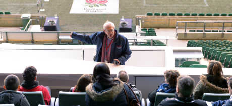 Tour guide taking group on Twickenham Stadium tour