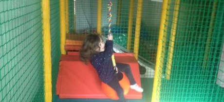 Girl in soft play area at Paradise Found Educational Farm Park in Sapcote