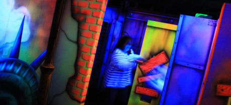 Woman playing laser tag at Lazer Fazer in Nelson
