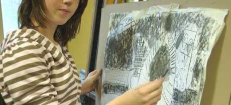 Girl drawing at Ipswich Museum