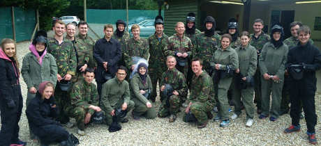 Young adults playing paintball at Arena Pursuits in Wadhurst