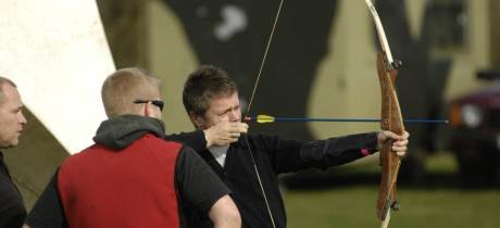 Boy doing archery at The Edge Adventure Activities in Much Wenlock