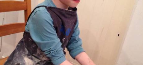 Boy doing pottery at Crafty Owls Pottery Cafe and Art Studio in Wakefield