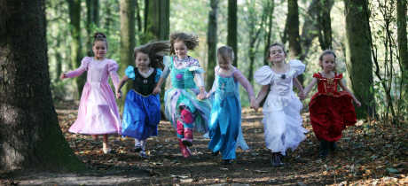 Girls in dresses running at Hardwick Park in Sedgefield