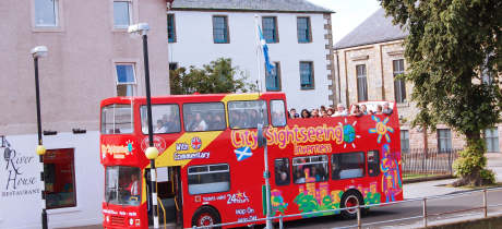 Passengers on City Sightseeing Inverness Hop On Hop Off bus