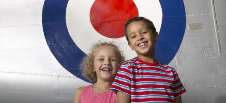 Kids by aircraft at Royal Air Force Museum Cosford in Shifnal