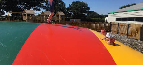 Kids on bouncy pillow at Attwell Farm Park in Redditch