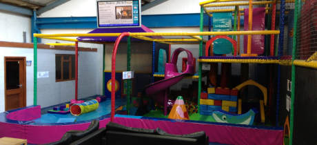Indoor soft play frame and seating area at Drakes Den in Plymouth