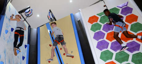 People climbing at Clip n Climb Dundonald in Belfast