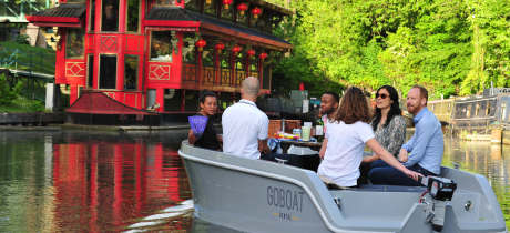 Visitors picnicking on boat at GoBoat London