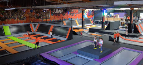 Kids jumping on trampolines at Jump Jam Trampoline Park in Bridgend