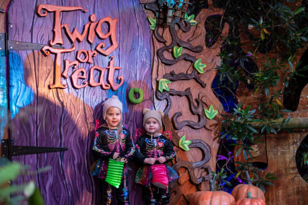 two girls outside twig or treat door two girls outside twig or treat door