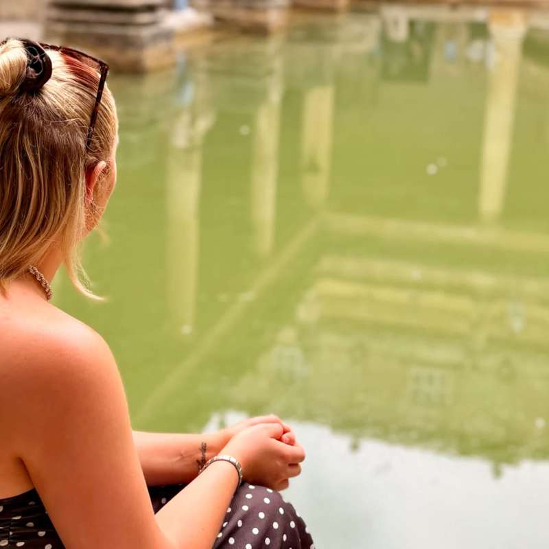 Taking a quiet moment beside the Great Bath. Surrounded by nearly 2,000 years of history, I found this part of our visit unexpectedly emotional and one I’ll remember for a long time.