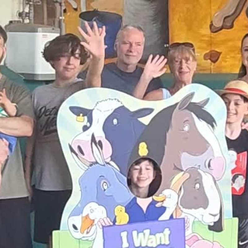 All of the family taking a photo at the entrance area